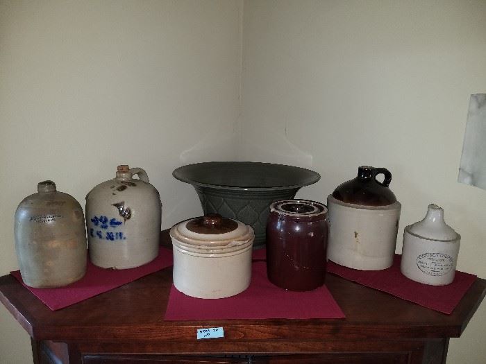 Salt glazed pottery, wine jugs