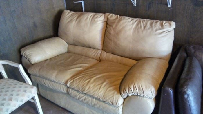 Over Stuffed Love Seat (tan) leather style upholstery