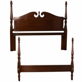 Dixie Furniture "Georgian Manor" Bed Frame: A traditional queen size bed frame. The queen bed frame was made by Dixie Furniture for Lexington Furniture. The piece is part of their “Georgian Manor” collection and features Chippendale styling. The piece features a headboard with broken pediment and finial adornment. The headboard and footboard both feature turned, beveled posts. The piece is marked to the verso. Please see items 17CLT104-070 and 17CLT104-111 for coordinating pieces.