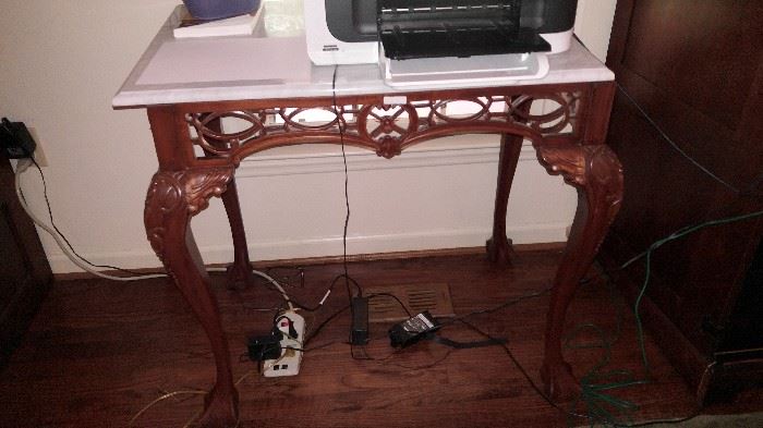 Marble top mahogany Chipendale Ball and claw foot table