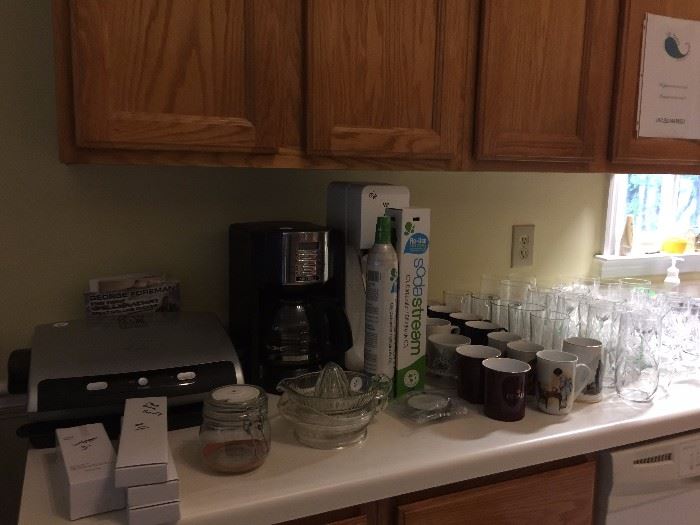 A soda stream, a coffee maker, and a George Foreman - add juicers and knives - call it done!