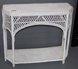 A WICKER SIDE TABLE