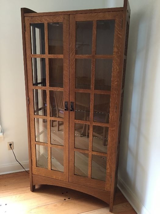 Stickley China cabinet, Solid Oak with Glass shelves. One of a kind Craftsmanship, inside lighting !