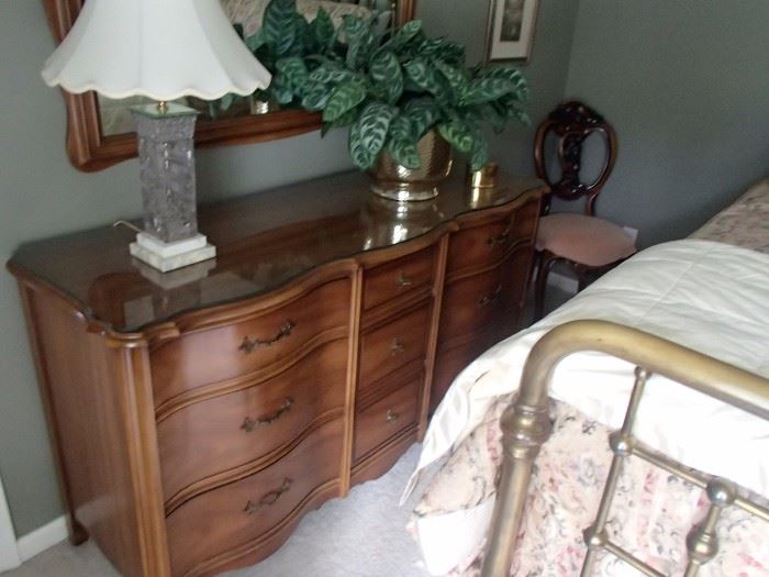 Dresser in brass bedroom 