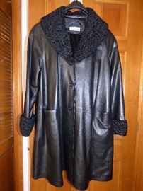 This leather coat is so SOFT it feels like satin !  With curly lamp cuffs & collar
