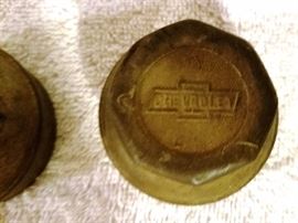 Two Chevrolet Hub Covers