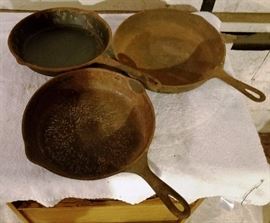 Three Cast Iron Skillets