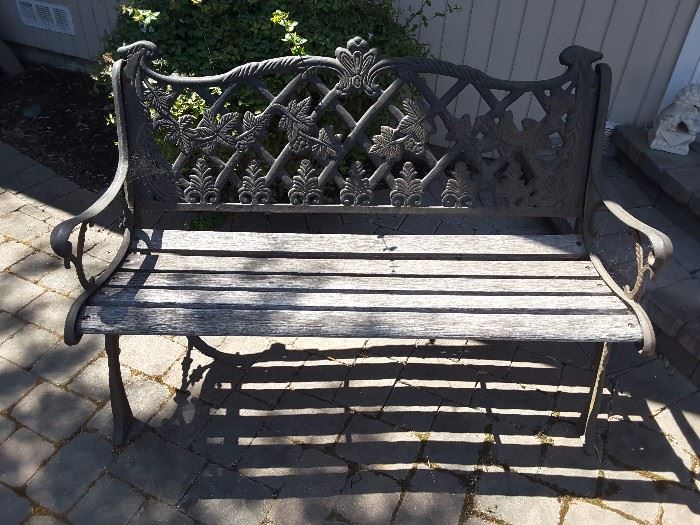 Outdoor Metal and Wood Sitting Bench, wood needs refinishing. Leaf pattern on back.