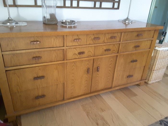 13 Dresser Oak Drawer with lower cabinet where doors open up. Long Dresser 6 foot long and 3.5 to 4 foot wide. You will need at least 2 or 3 men to move this dresser. 1992 from Macy's.