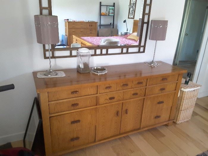 Close up of 13 Dresser Oak - With two decorative lamps. Large square decorative bedroom mirror. 1992 from Macy's.