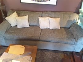 Sage living room sofa/couch - 3 seater, comfy - has a matching arm chair, 4 white pillows. Pottery Barn from 2001. Sofa is an amazing couch for guests to sleep on.