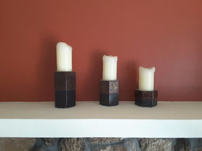 3 Candles in various sizes.