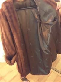 Mink Coat, Red Brown Color. Collar. Satin Lining. This Coat is a short Coat about 5 feet in length. Purchased in 1960 in New Yor.