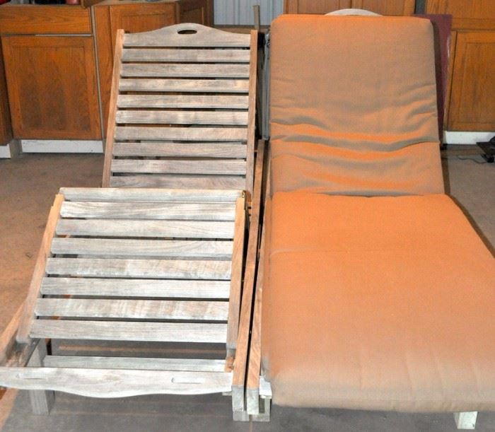 Adjustable teak steamer chairs and cushions.