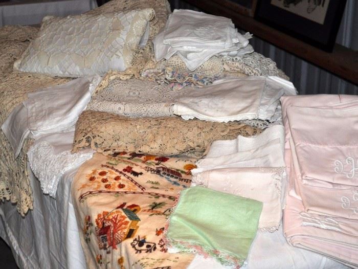 Crocheted bedspread, pillow, needlework, vintage handkerchiefs.