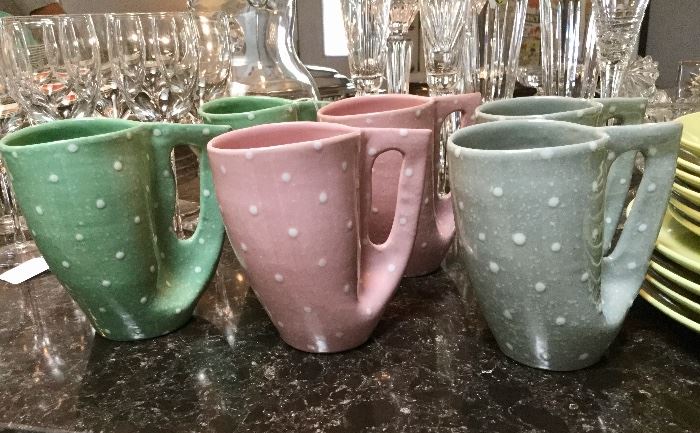 Midcentury clay/glazed mugs.