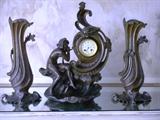 A de Raudery Mantle Clock and matching Vases