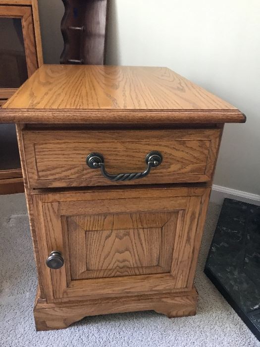 Oak side table with magazine pull out in the rear