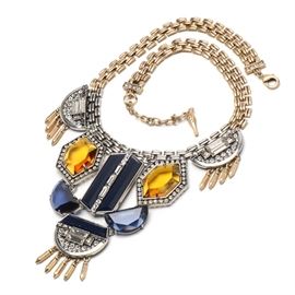 Chloe & Isabel "Grand Cabaret" Statement Necklace: A Chloe & Isabel Grand Cabaret statement necklace. This bold costume necklace features bezel set navy and topaz amber resin stones, with faceted and beveled clear glass accents in a silver-tone setting with gold-tone fringe and a lobster claw clasp. The necklace is marked “Chloe & Isabel” to a bird charm at clasp, coming housed in the original Chloe & Isabel presentation box.