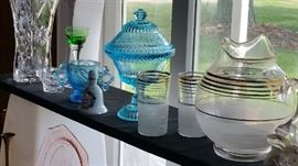 A Large table of glassware and china