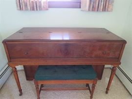 The Antique Gulbransen piano closes like a desk.. Great for repurposing!