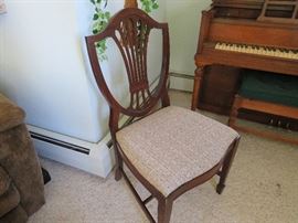 One of the Duncan Phyfe Hepplewhite Shield back chairs