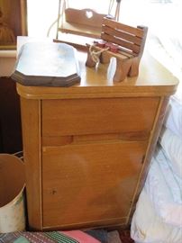 Night stand in first bedroom