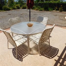 Tropitone strap patio furniture and table