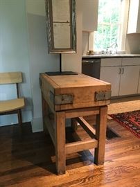 A wonderful chopping block from England. Above, a pair of French legal documents, circa 1810, mounted in a silver-gilt frame from the late 1800s.