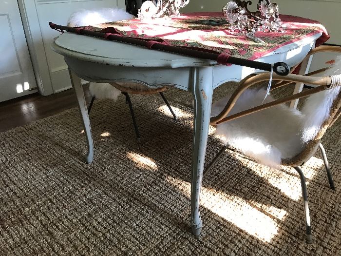 A beautiful French-style dining table from Ashley Gilbreath's shop on Graham Street.  A very unusual 19th c. Italian tapestry with iron rod.  A wonderful pair of mid-19th c. French sconces from the estate of Will Hill Tankersley, Sr.  Below, an 8x10 jute rug.  