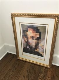 Salvador Dali lithograph in gilded frame.