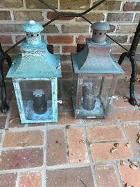 Deeply patinated pair of outdoor copper sconces. Solid condition but have been used on the Gulf and wil require rewiring.