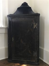 Middle 19th c. Chinoiserie corner cabinet from England.
