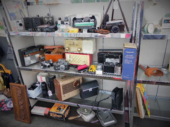 Vintage Cameras, Radios, Binoculars, Radio Shack Head Phones, Panasonic Tape recorder,  Antique Bed warmers...