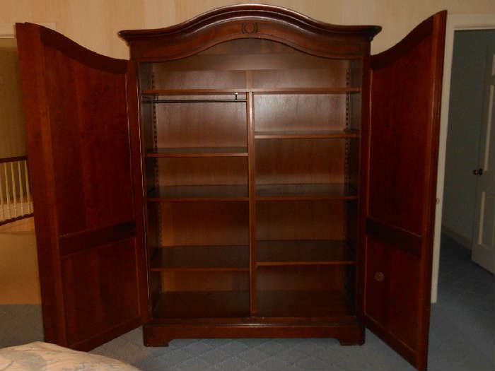 First Floor Hall:  The GRANGE armoire/wardrobe is now open to reveal lots of storage space.  To the left is a bar from which you can hang clothing if you remove the adjustable shelves.
