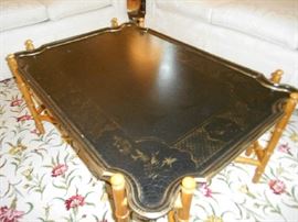 Living Room:  A view of the top of the two-piece BAKER Country French leather tray with faux bamboo stretcher coffee table.