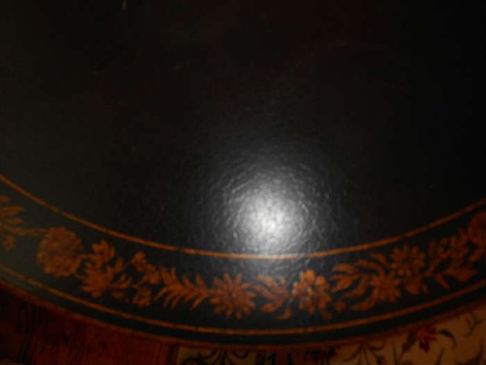  Living Room:  A closer view of the top of the round black/gold pedestal table.