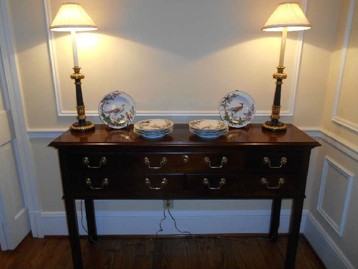 Dining Room:  This COUNCILL CRAFTSMEN server has five drawers, including one felted flatware drawer.  It measures 52" wide x 14" deep x 32" tall.  On top are more MOTTAHEDEH Chelsea Bird porcelain dishes as well as a pair of 26" tall black/gold candlestick lamps.