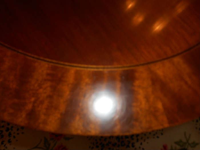 Dining Room:  This is a closer view of the dining table's banded edge.