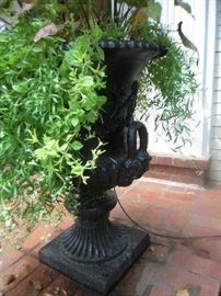 Entryway: This is one of a PAIR of 30" tall heavy black cast iron planters with live plants.