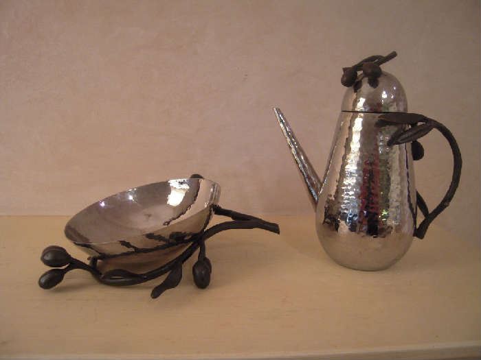 Kitchen-SMALLS Area:  Two MICHAEL ARAM olive branch treasures:  an olive bowl AND an oil dispenser.  