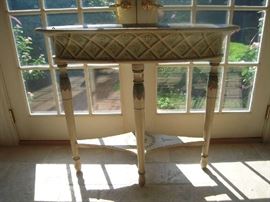 Sun Room-Atrium:  CHELSEA HOUSE offered this fun oval painted plant stand with an inner removable metal liner.  Its total measurements are 38" wide x 18-l/2" deep x 33" tall. 