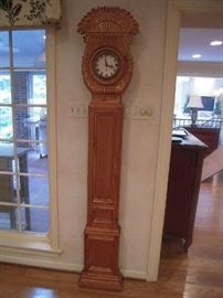 Kitchen:  This tall, narrow pine clock measures 80" tall x 14" wide at the base. The clock face states it was made in Spain.