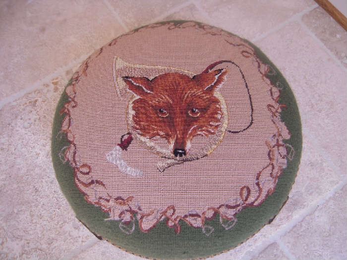 Sun Room-Atrium: The cute needlepoint stool has a fox face, horn, and riding crop scene.  Great gift for your English riding friend.