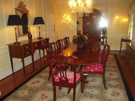 Dining Room:  This is an overview of the dining room.   Notice the COUNCILL CRAFSTSMEN sideboard on the left, the BAKER bonnet top cabinet on the far wall, and the STARK rug.  The table is also made by COUNCILL and it is priced separately from the eight dining chairs.  Detailed photos of the furniture are coming up. 