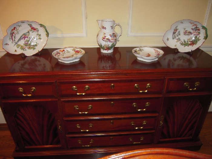 Dining Room:  This LAMMERT'S credenza has six drawers and two side doors.  It measures 62" wide x 17" deep x 31" tall.  Displayed on top are just some of the "MOTTAHEDEH Williamsburg-Vista Alegre Chelsea Bird" porcelain.  The Chelsea Bird porcelains were inspired by the exotic bird designs found on a set of plates produced by the Chelsea Porcelain Manufactory in England between 1758 and 1769.  