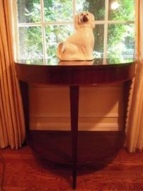 Dining Room:  The BAKER (by Thomas Pheasant) mahogany demi-lune table with under-shelf measures 36" wide x 18" deep x 31" tall.  Sitting perfectly still is a porcelain Staffordshire dog.