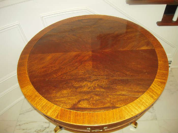 Foyer: This is the top of the 31" round Regency table.  Notice the different color woods with the grained outer banding.