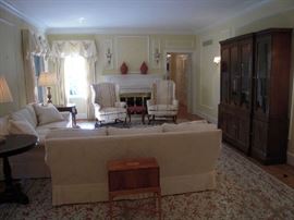 Living Room:  This is an overview of the large living room.  Notice the two matching ivory sofas, coordinating wingback chairs, STARK custom made rug and COUNCILL CRAFTSMEN breakfront.  Individual photos with details are coming up!