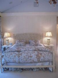 Master Bedroom-First Floor: The headboard and footboard are now shown with the king size bed which has pale blue/taupe toile bedding. The toile bedding is priced as a group and includes the duvet cover, duvet insert, two shams, two pillows and a matching bed skirt.  The pale blue quilted spread and two shams/two pillows are priced as a separate grouping.  The high quality king size pillow-top mattress set is labelled "Heavenly Bed" and is by WESTIN.  A closer photo of the side tables and lamps follows.